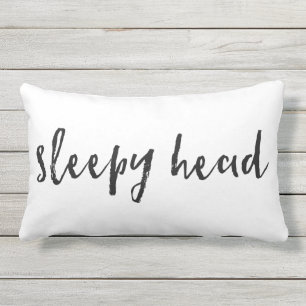 Coussin principal somnolent de typographie