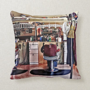 Coussin Raseur-coiffeur avec le support de manteau