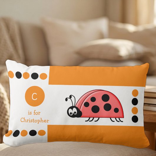 Coussin Rectangle Coccinelle orange et blanche monogramme pour enfan