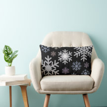 Flocons de neige aux couleurs pastel sur fond noir