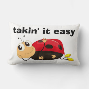 COUSSIN RECTANGLE "PRENDS ÇA MOLLO" COCCINELLE