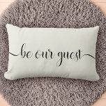 Coussin Rectangle Soyez notre invité Modern Style Home<br><div class="desc">Modern trendy script calligraphy with flourishes reading "Be our guest" on this elegant black and ivory lumbar throw pillow,  perfect to welcome guests to your home,  vacation rental,  or bed and breakfast.</div>