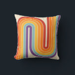 Coussin Retro 1970s Style Arched Stripes Geometric Pattern<br><div class="desc">This artwork channels a retro graphic spirit, forming the letter‑like curve with parallel bands of red, orange, yellow, light blue, teal, and purple. The layered arcs flow in harmony, evoking the bold optimism of 1970s design. Set against a soft beige background, the vibrant rainbow palette stands out with clarity and...</div>