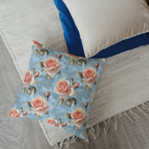 Coussin Roses élégantes couleur pêche sur fond bleu