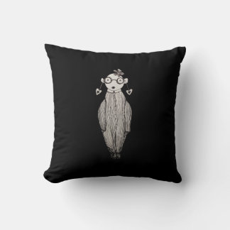 Coussin Rouge à lèvres foncé et lunettes