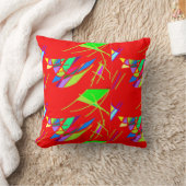 Coussin rouge avec motifs bleu vert (Couverture)