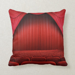Coussin rouge de divan de jet de théâtre de rideau