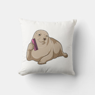 Coussin Sceau comme coiffeur avec peigne