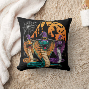 Coussin Serpents d'Halloween en costumes vibrants la nuit