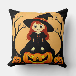 Coussin Sorcière dans un décor d'Halloween avec des citrou