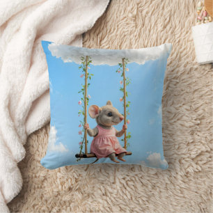 Coussin Souris Fille En Robe Rose Sur une Balancoire