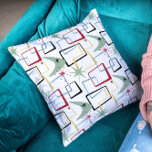 Coussin Starburst atomique Boomerang Carré milieu du siècl<br><div class="desc">Ajoutez une touche de couleur à votre canapé ou à votre lit avec cet oreiller branché rétro. Le motif présente des carrés abstraits,  des étoiles et un boomerang aux couleurs rouge,  vert,  bleu,  jaune et noir. Cela égaye votre décor !</div>