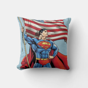 Coussin Superman tenant le drapeau américain