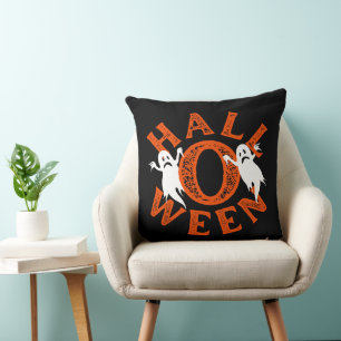 Coussin Tape à l'Œil Orange Typographie Fantômes