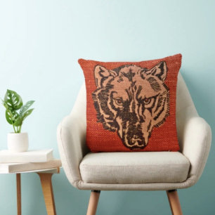 Coussin Tête de loup sur fond rouge