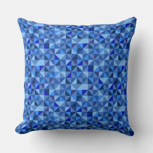 COUSSIN TONS CLAIRES DE MOTIFS GÉOMÉTRIQUES BLEUS