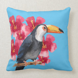 Coussin Toucan avec les fleurs tropicales rouges