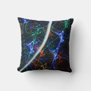 Coussin Traînées de lumière néon Photographie abstraite. C