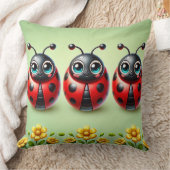 Coussin Trois coccinelles colorées sur fond vert (Couverture)