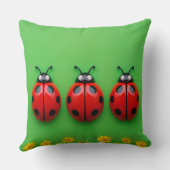 Coussin Trois coccinelles colorées sur fond vert (Verso)