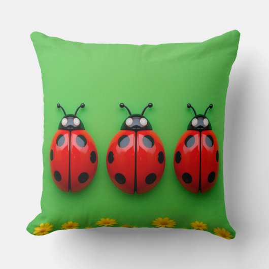 Coussin Trois coccinelles colorées sur fond vert (Recto)