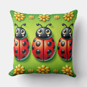 Coussin Trois coccinelles colorées sur fond vert