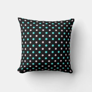 Coussin turquoise et pois roses sur fond noir