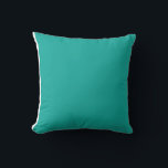 Coussin un arrière - plan vert avec un<br><div class="desc">Le design est un carré bleu vif avec une couleur uniforme et une texture lisse. Il se démarque de l'arrière - plan par un contraste visuel saisissant.</div>