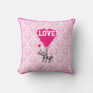 Coussin Un éléphant romantique sur un damas rose