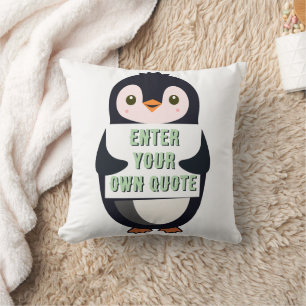 Coussin Un manchot tenant un panneau avec un texte personn