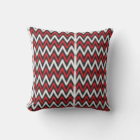 un motif en zigzag rouge et noir sur fond blanc
