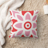 Coussin un motif rouge et blanc avec une fleur (Couverture)