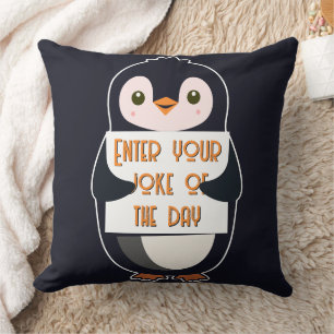 Coussin Un pingouin tenant un panneau avec un texte person