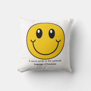 Coussin Un sourire chaleureux est le langage universel de 