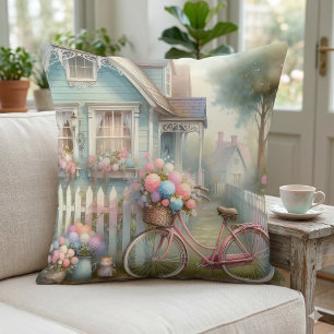Coussin Vélo à fleurs roses à la porte du cottage bleu