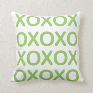 Coussin vert et blanc de XOXO