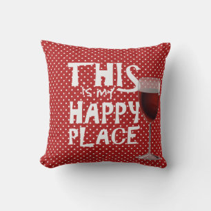 Coussin vin rouge et citation pois