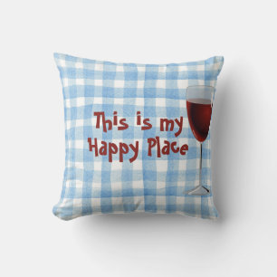 Coussin vin rouge et citation sur l'aquarelle bleue