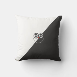 Coussin visage noir et blanc