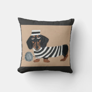 Coussin Voleur de friandises teckel noir et marron oiseau