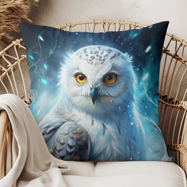 Coussin Winter Magic Snowy Owl Mystic Blue Throw Pillow (Winter Magic Snowy Owl Mystic Blue Throw Pillow in a boho rattan armchair.)