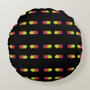 COUSSINS RONDS CONCEPTION DE FEUILLES EN DANSE SUR NOIR