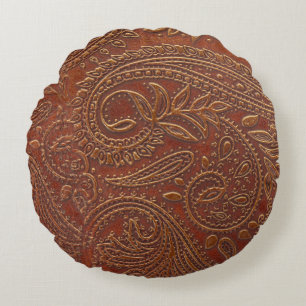 Coussins Ronds Cuir Brown, motifs floraux à outils.