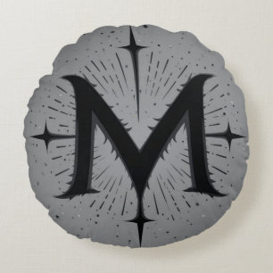 Coussins Ronds Design 'M' noir élégant avec des étoiles symétriqu