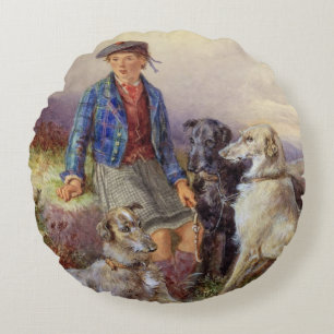 Coussins Ronds Garçon écossais avec des chiens-loup dans un