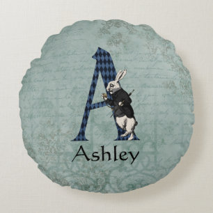 COUSSINS RONDS LETTRE TAPIS BLANC A