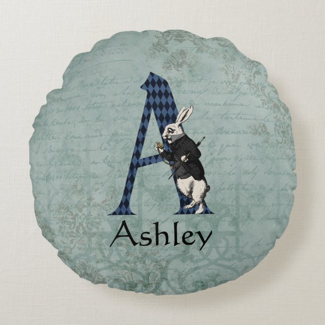 COUSSINS RONDS LETTRE TAPIS BLANC A (Devant)