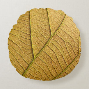 Coussins Ronds Motif de feuille jaune doré le matin.