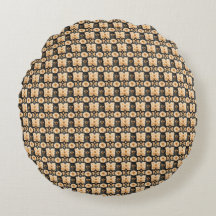 Oreiller rond à motif floral noir et or