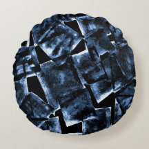Oreiller rond à motif géométrique